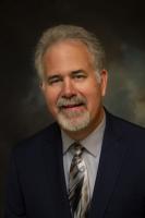 T Abraham - Board Treasurer